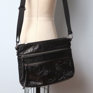 The Sak Black embossed leather shoulder/ cross body  bag